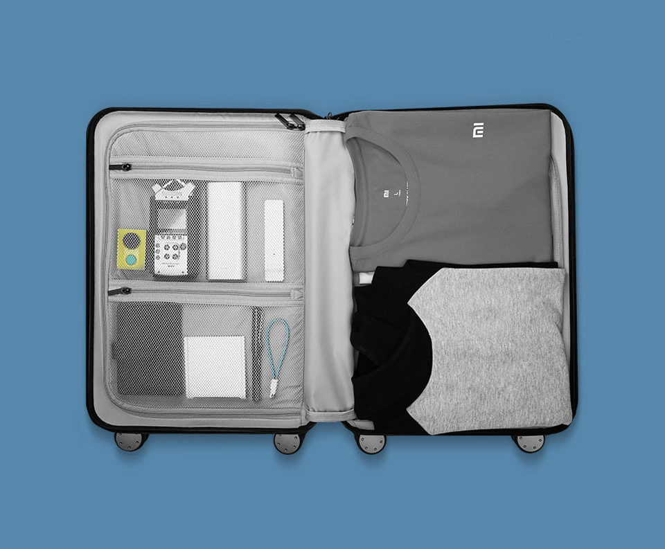 Валіза RunMi 90 Points suitcase Maсaron Green 20 "розміщення речей у валізі